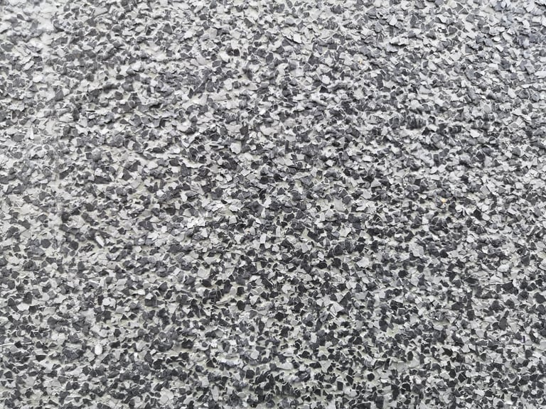 Color flake flooring textured background with flake stone