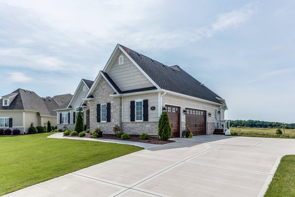 Three car garage with wide driveway at a rural North Florida home