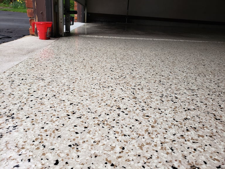 Interior of a clean garage with professional epoxy coating