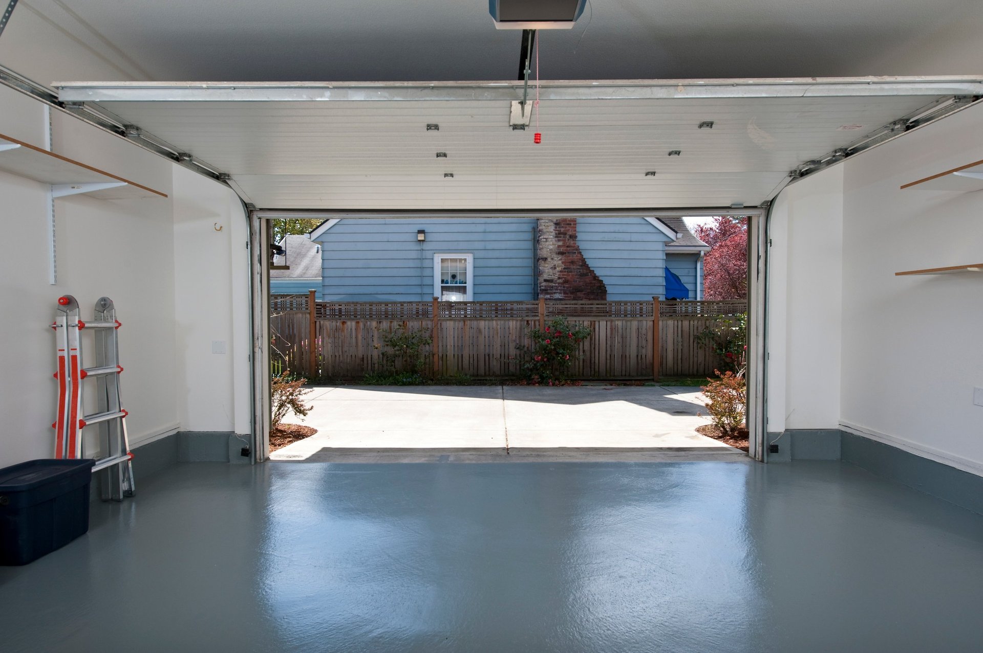 Interior of a clean garage with professional epoxy coating