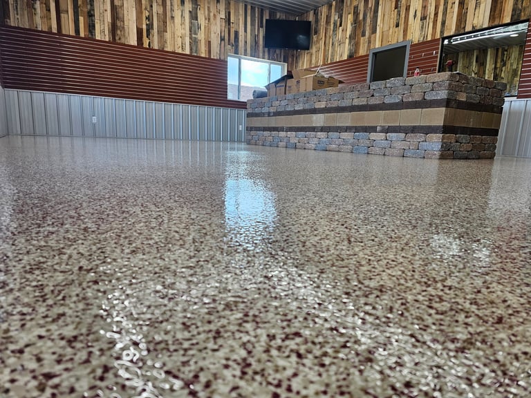 Epoxy full flake broadcast system for business showing durable commercial finish