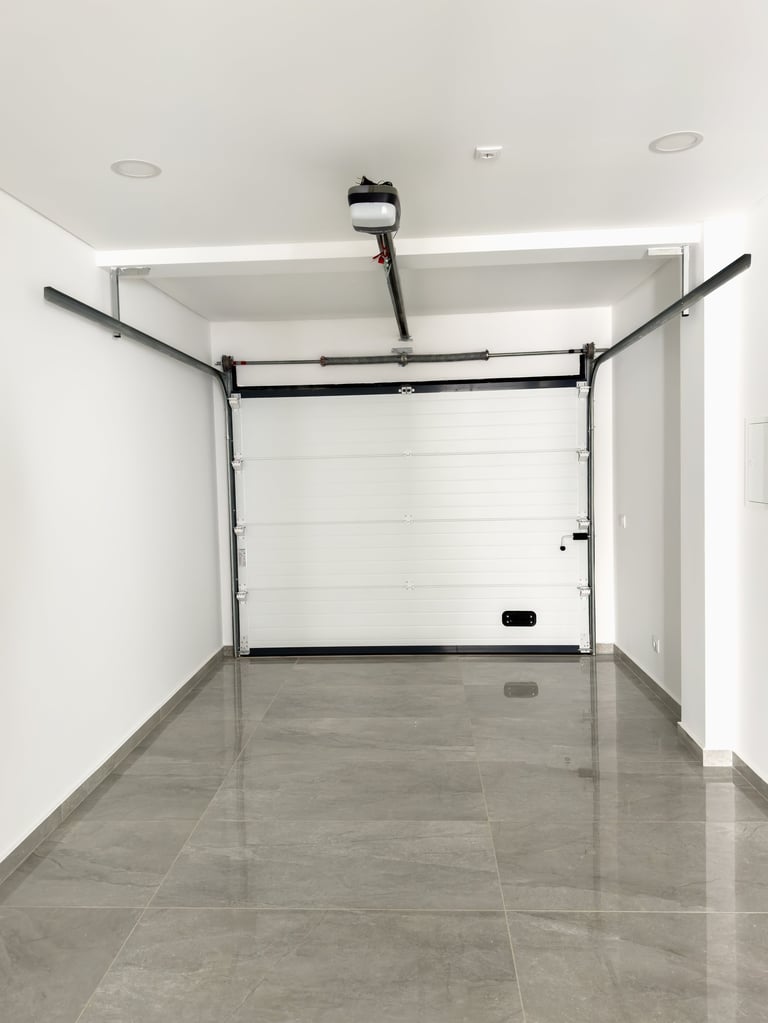Modern garage with polished gray tiled flooring showing contemporary design